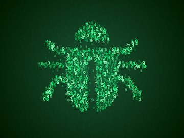 Malware und Ransomware: Was ist das? Grüner digitaler Bug auf einem Monitor.